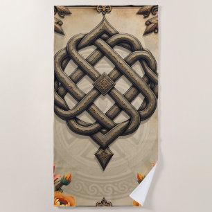 Celtic art and floral splendour in warm tones.  beach towel
