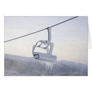 Chair lift full of snow and ice