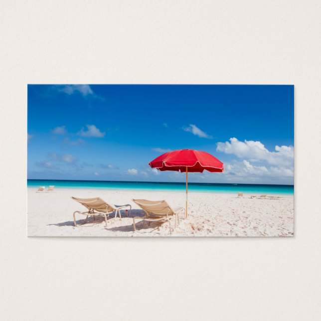 Chairs and umbrellas on a tropical beach (Front)