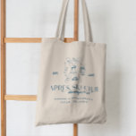 Champagne on Ice | Après Ski Winter Bachelorette<br><div class="desc">Celebrate your bachelorette party in style with these chic Après Ski tote bags, perfect for winter getaways and snowy adventures! Featuring a stylish and playful design with crossed skis, champagne flutes, and snowflakes, these totes add a touch of luxury to your ski-themed celebrations. Whether you're hitting the slopes in Aspen...</div>