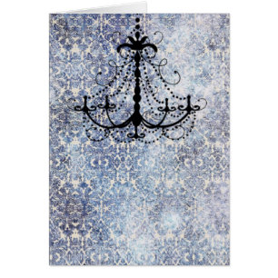 Chandelier on blue faux vintage wallpaper