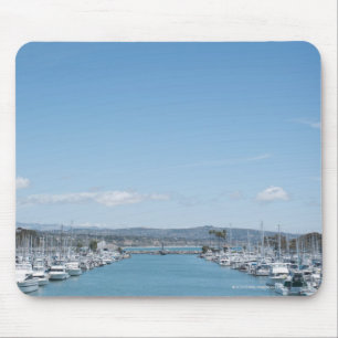 channel in harbour on a sunny day with blue sky mouse pad