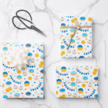 Chanukah Dreidels Doughnuts Gold Blue White Wrapping Paper Sheet<br><div class="desc">Sometimes you just have a few items to wrap for Chanukah, and you don't want to buy a huge roll of Chanukah wrapping paper that will linger in your closet for years. This selection of three Chanukah wrapping paper sheets is perfect for wrapping a few gifts. Three separate sheets of...</div>