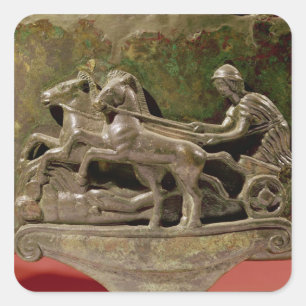 Charioteer in his chariot, detail from a cist square sticker