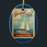 Charlevoix Sailboat Vintage Travel Michigan Ceramic Tree Decoration<br><div class="desc">This Greetings From Charlevoix Michigan vintage travel nautical design features a boat sailing on the water with seagulls and a blue sky filled with gorgeous puffy white clouds.</div>