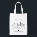 Charlotte, N. Carolina Wedding | Stylised Skyline Reusable Grocery Bag<br><div class="desc">A unique wedding bag for a wedding taking place in the beautiful city of Charlotte,  N. Carolina.  This bag features a stylised illustration of the city's unique skyline with its name underneath.  This is followed by your wedding day information in a matching open lined style.</div>