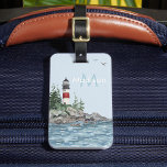 Charming Coastal Lighthouse Rocks Monogram Name Luggage Tag<br><div class="desc">A lovely watercolor picture -- lighthouse on the rocks,  blue water -- and your monogram / initial and name.  Any design questions or if you'd like to have this available for digital download,  just send a chat or an email to charmdesignstudio@rcn.com and we'll be delighted to assist.</div>