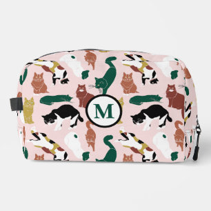 Charming hand-drawn cats on pink background dopp kit