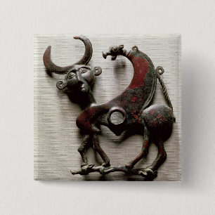Cheek piece of a horse bit in the form of a human- 15 cm square badge