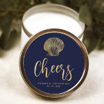 Cheers Navy Blue Gold Coastal Beach Wedding Classic Round Sticker<br><div class="desc">A gold vintage illustration of a scallop seashell decorates this classy coastal beach wedding sticker,  featuring gold-coloured text on a navy blue background. The word "Cheers" appears in elegant handwriting script. Add the names of the couple and the wedding date below.</div>