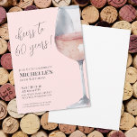 Cheers To 60 Years Pink 60th Birthday Invitation<br><div class="desc">"Cheers to 60 years!" is proudly displayed at the top of this classic and elegant invitation, featuring a large watercolor pink and grey wine glass on the right side, giving it a modern twist. You can customise the year to celebrate any milestone. The design uses script typography for "Cheers to...</div>