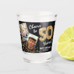 Cheers to the Years 50th Birthday 2 Photo Shot Glass<br><div class="desc">Celebrating the BIG 50! These shot glasses allow you to upload a before and after photograph of the birthday man or woman in a faux gold frame, with the title 'Cheers to 50 Years!'. Featuring a rustic chalkboard background, faux gold number 50 helium balloons, faux gold glitter confetti, a Happy...</div>