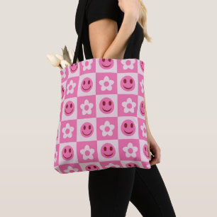 Chequered flowers and happy faces pink tote bag