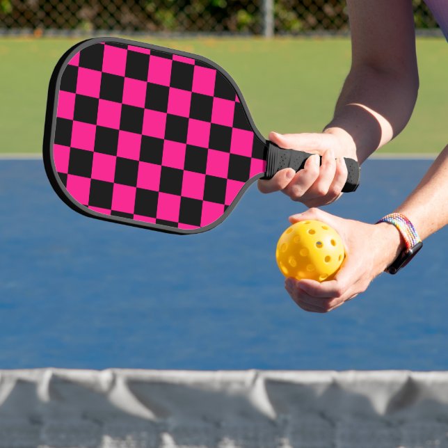 Chequered squares hot pink black geometric retro pickleball paddle (Insitu)