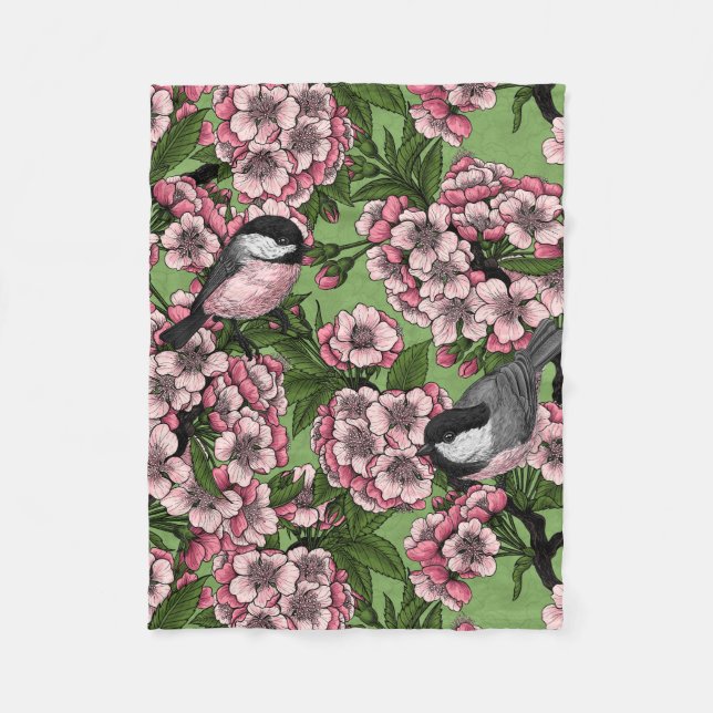 Cherry blossom and chickadees on green fleece blanket (Front)
