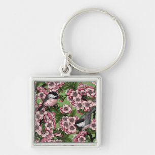 Cherry blossom and chickadees on green key ring