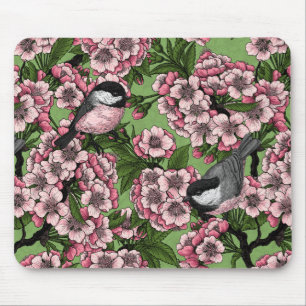 Cherry blossom and chickadees on green mouse pad
