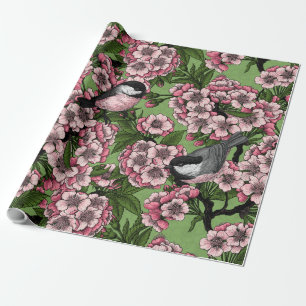 Cherry blossom and chickadees on green wrapping paper