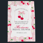 Cherry Sweet Pink Coquette Bow Bridal Shower Favou Medium Gift Bag<br><div class="desc">Someone cherry sweet is tying the knot and you’re the cherry on top of their sweet celebration. Add a nostalgic touch to your bridal shower with this Pink Gingham Cherry Party Decor featuring vibrant red cherries and pastel pink gingham, all within a whimsical wavy border. With this playful design, get...</div>
