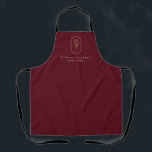 Chic Bohemian Golden Floral Logo Apron<br><div class="desc">Chic Bohemian golden floral logo,  professional apron. Soft faux golden foil frame with line-art floral stem and delicate hand on dark burgundy red colour background.</div>