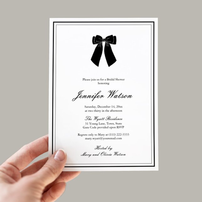Chic Bow Black And White Old Money Bridal Shower Invitation (Classy black bow Old Money aesthetic bridal shower invitation with elegant border and calligraphy)