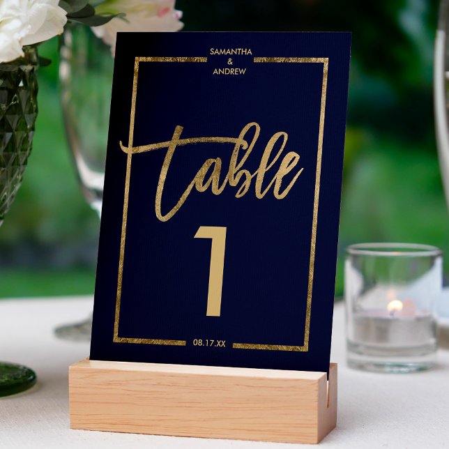 Chic gold frame script navy blue table number (Creator Uploaded)