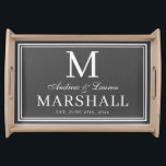 Chic Grey Newlywed Couple Monogram Name Wedding Serving Tray<br><div class="desc">Modern minimalist personalised dark grey and white serving tray with the couples first names in a calligraphy script,  last name monogram,  full last name,  and wedding date available in customisable templates.  A stylish,  elegant newlywed gift for the bride and groom with a custom personal touch.</div>