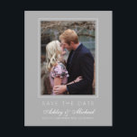 Chic Grey Save the Date Engagement Photo Announcement Postcard<br><div class="desc">Modern, chic save the date photo postcard with elegant script and modern typography. The save the date card has a grey background with a subtle thin white frame around the photo. You can easily customise this save the date card with your upcoming wedding details, your engagement photo and a personal...</div>