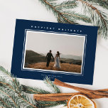 Chic Minimalist Elegance Navy Blue Christmas Photo<br><div class="desc">This elegant holiday photo card features one horizontal photo, classic raised foil frame around the photo, and a greeting in raised foil over a navy blue background. The greeting on the front is editable so it's easily changed to anything you like. The back of the card is the same navy...</div>
