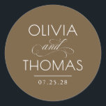 Chic Modern Minimalist Typography Brown Wedding Classic Round Sticker<br><div class="desc">Minimalist brown wedding seals place the couple’s names front and centre — boldly presented and elegantly connected by a calligraphic “and” that adds a graceful,  romantic flourish.

Fully customisable to reflect your unique style — with adjustable text and background colours to perfectly complement your wedding aesthetic.</div>