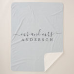 Chic Newlywed Mr Mrs Ice Blue Monogram Sherpa Blanket<br><div class="desc">Chic, modern monogrammed sherpa blanket with the text Mr and Mrs in off-black elegant script on an ice blue background. Simply add your married name. The colour ice blue is used for this stylish design. Perfect luxury gift for the newlywed couple. Exclusively designed for you by Happy Dolphin Studio. If...</div>