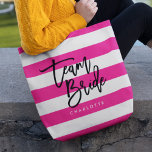 Chic Pink and White Stripes Black Team Bride Tote Bag<br><div class="desc">All-Over-Print Tote featuring the words "Team Bride" in black trendy script against a pink and white stripes pattern background. Perfect for weddings for bridesmaids, maid of honour and flower girl. For other matching items see here https://www.zazzle.com/collections/119250194970828530?rf=238364477188679314 Personalise it by replacing the placeholder text. For more options such as to change...</div>