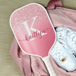 Chic Rose Gold Glitter Monogram Script Name Pickleball Paddle<br><div class="desc">Personalised pickleball paddle featuring chic rose gold glitter and rose gold and pink faux foil ombre with a monogram and name shown in an editable trendy handwritten script typography for the pickler or pickleball player who would love to add a little sparkle and glam to her game. PADDLE OPTIONS: Choose...</div>