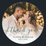 Chic Sage Green Script Wedding Photo Thank You Classic Round Sticker<br><div class="desc">Modern Pretty Sage Green Calligraphy Script Thank You | Couple Photo Wedding sticker/label for yor gift favour. Featuring an elegant handwritten style calligraphy overlay with text „Thank You”.</div>