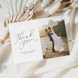 chic script black and white wedding photo thank you card<br><div class="desc">A modern simple wedding thank you card with a wonderful black script and a personalised photo of the bride and groom.  Add a personal thank you message to your guests.</div>