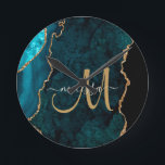 Chic Teal Gold Glitter Agate Custom Monogram Round Clock<br><div class="desc">Add a touch of glitter and glam to your home decor with this elegant personalised clock featuring a teal agate accented with faux gold glitter. Personalise your monogram initial in hand lettered script calligraphy with your name above. A unique girly gift for birthday, holidays and any special occasion. Designed just...</div>
