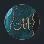 Chic Teal Gold Glitter Agate Custom Monogram Round Clock<br><div class="desc">Add a touch of glitter and glam to your home decor with this elegant personalised clock featuring a teal agate accented with faux gold glitter. Personalise your monogram initial in hand lettered script calligraphy with your name above. A unique girly gift for birthday, holidays and any special occasion. Designed just...</div>