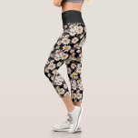 Chic White Daisies on Black Floral Pattern Capri Leggings<br><div class="desc">These leggings have a girly floral design featuring white daisies with yellow centres on a black background. Perfect for the gym,  work or just lounging around at home. Wear them with style! Designed by world renowned artist ©Tim Coffey.</div>