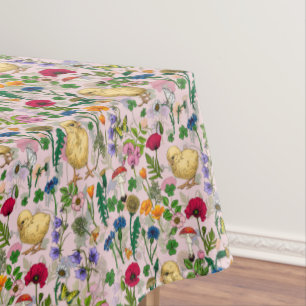 Chickens and wildflowers on cotton candy pink tablecloth