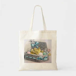 Chicks in basket with eggs and flowers tote bag
