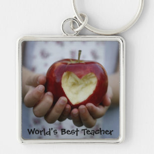 Child with apple heart key ring