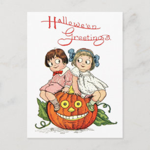 Children Sitting on Pumpkin Head Postcard