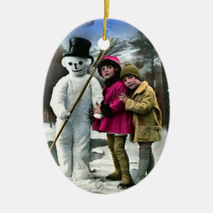 CHILDREN WITH SNOWMAN CERAMIC TREE DECORATION