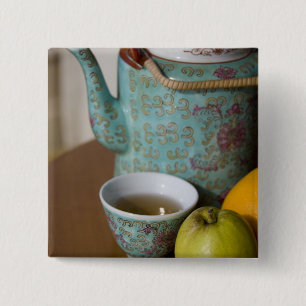China, Hong Kong. Traditional Chinese teapot & 15 Cm Square Badge