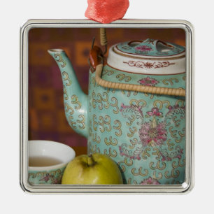 China, Hong Kong. Traditional Chinese teapot & 2 Metal Tree Decoration