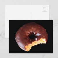 Chocolate Doughnut With Large Bite Taken Out of It