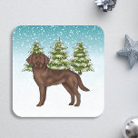 Chocolate Labrador Retriever Dog Blue Christmas Square Sticker<br><div class="desc">Destei's original cartoon illustration of a cute chocolate brown Labrador Retriever breed dog. The dog is placed in a winter scene with three green fir trees and falling snow. The background is a blue to white gradient giving the design that cold winter day look.</div>