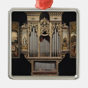 Choir organ with open panels metal tree decoration