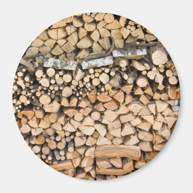 Chopped wood on a pile round magnet (Front)