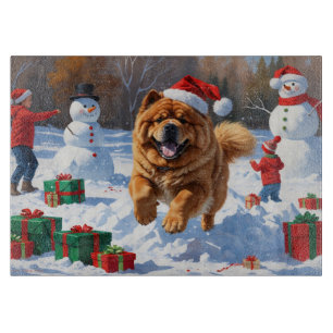 Chow Chow Running in Snow with Christmas Hat Cutting Board